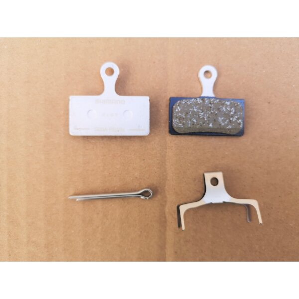 Shimano G03A Bremsbelag für Scheibenbremsen inkl. Feder und Splint